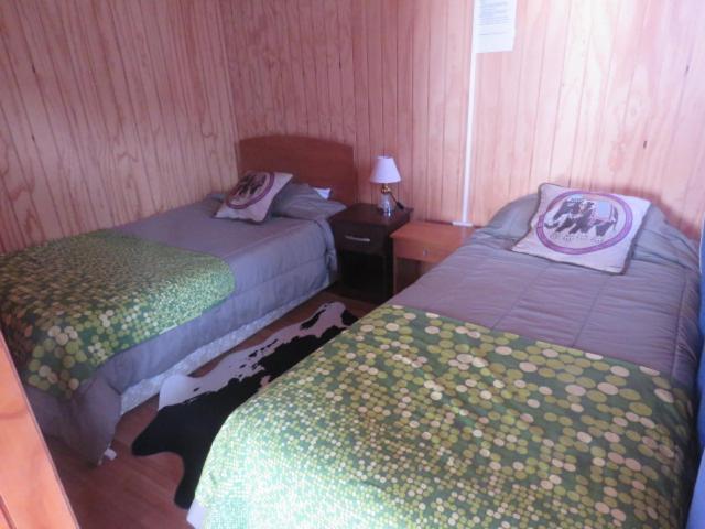 Hostal Y Cabanas Peumayen بويرتو غوادال المظهر الخارجي الصورة