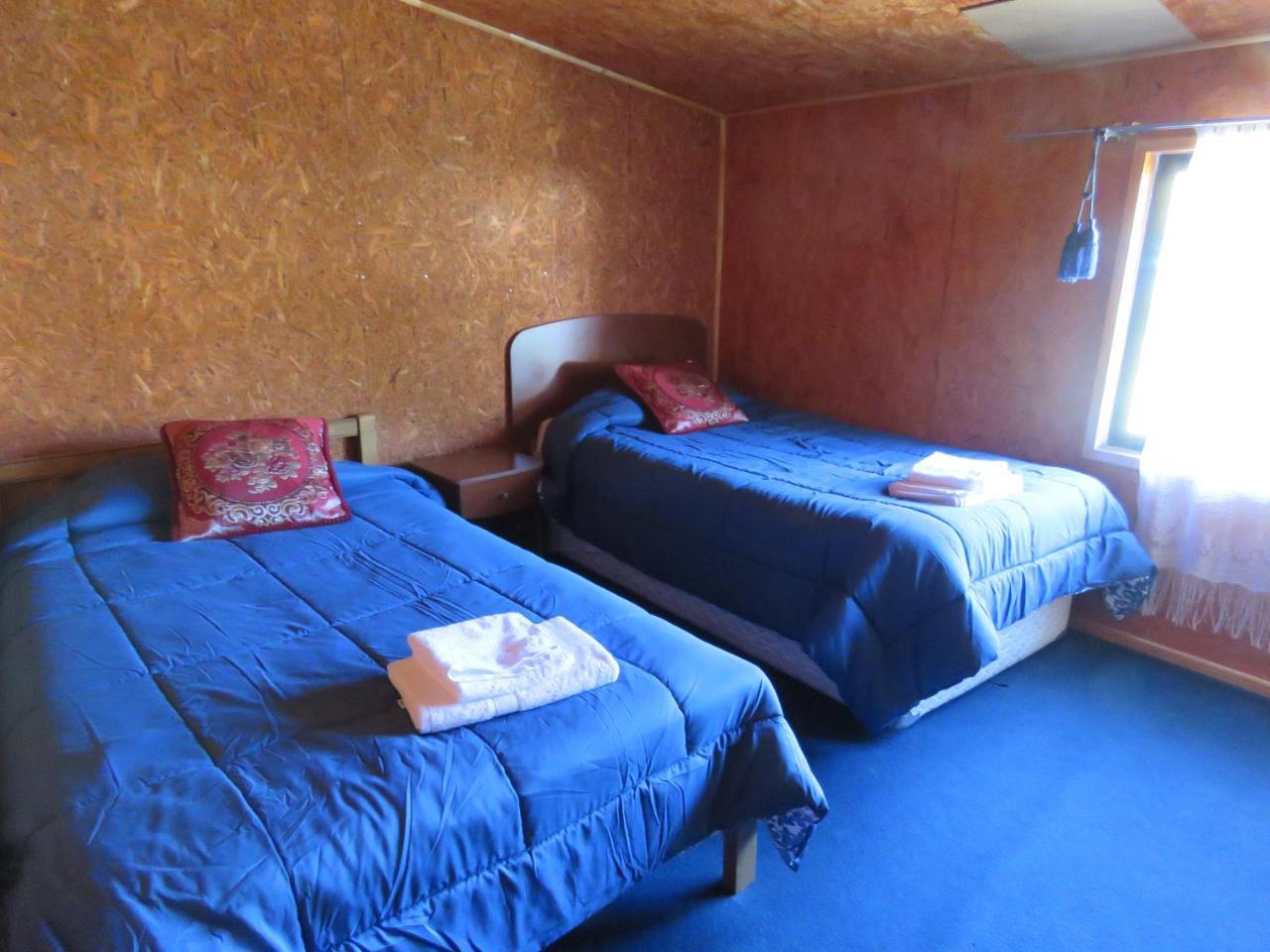 Hostal Y Cabanas Peumayen بويرتو غوادال المظهر الخارجي الصورة